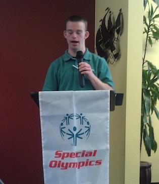 Tim Harris speaking as a Special Olympics Global Messenger.
