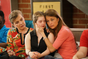 Cast member Megan cries while her mother, Kris, embraces her