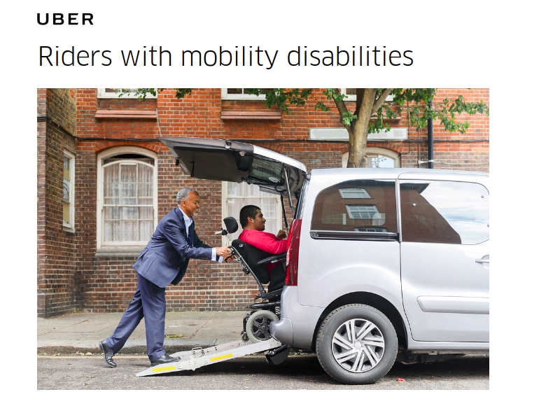 screeshot from uber accessibility site showing an image of an Uber driver assisting a rider in a wheelchair into an accessible vehicle